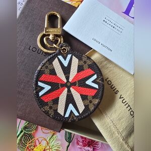 Authentic Louis Vuitton Round Monogram Keychain Or Charm